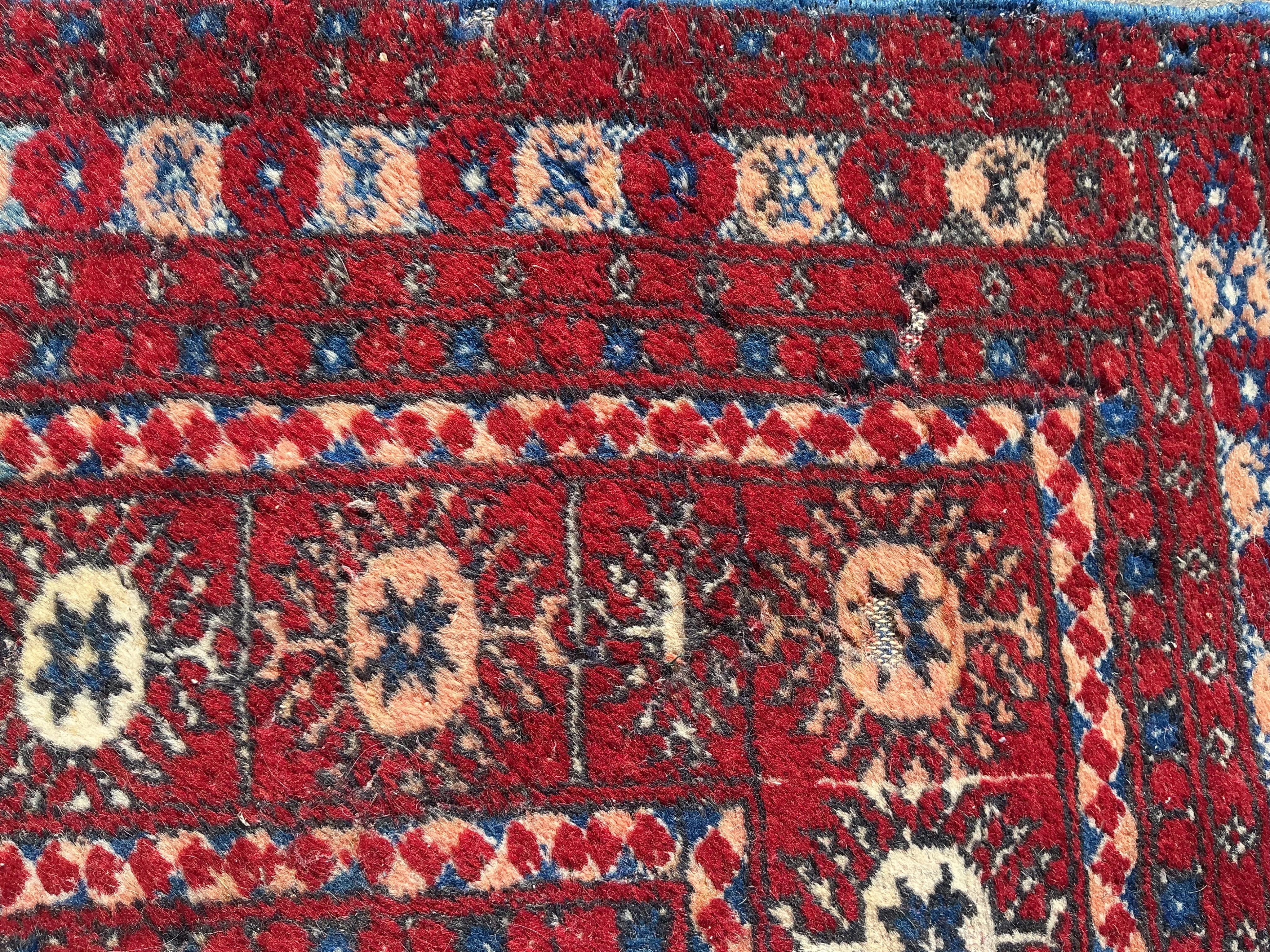 A Bokhara carpet, 345 x 215cm